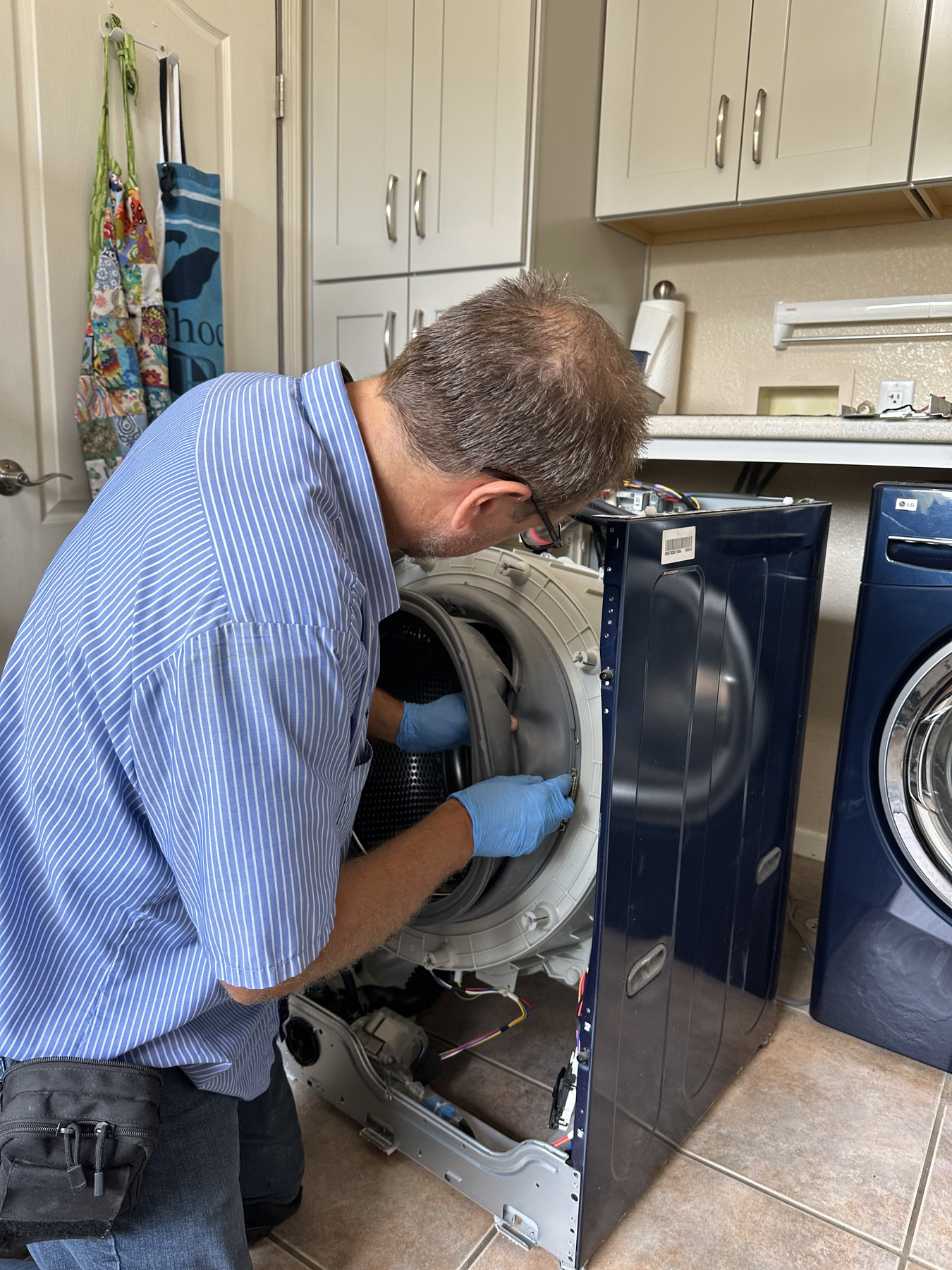 Repair work on the internal components of a washing machine